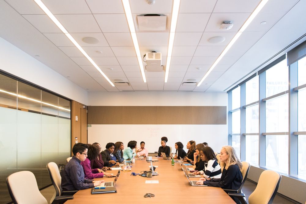 Team brainstorming together during a meeting
